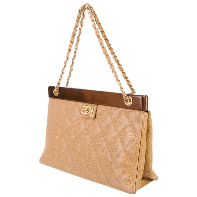 CHANEL, Timeless Classique bag in quilted coffee lambs…