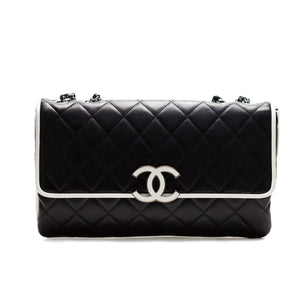 Chanel Black and White Lambskin Maxi Cruise Flap – House of Carver