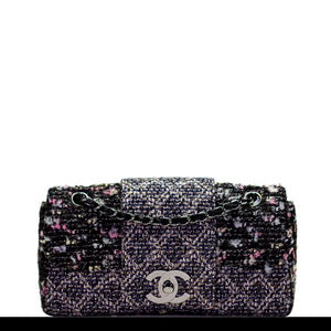 Is this the Chanel Classic Flap Bag but Embroidered? No, its not