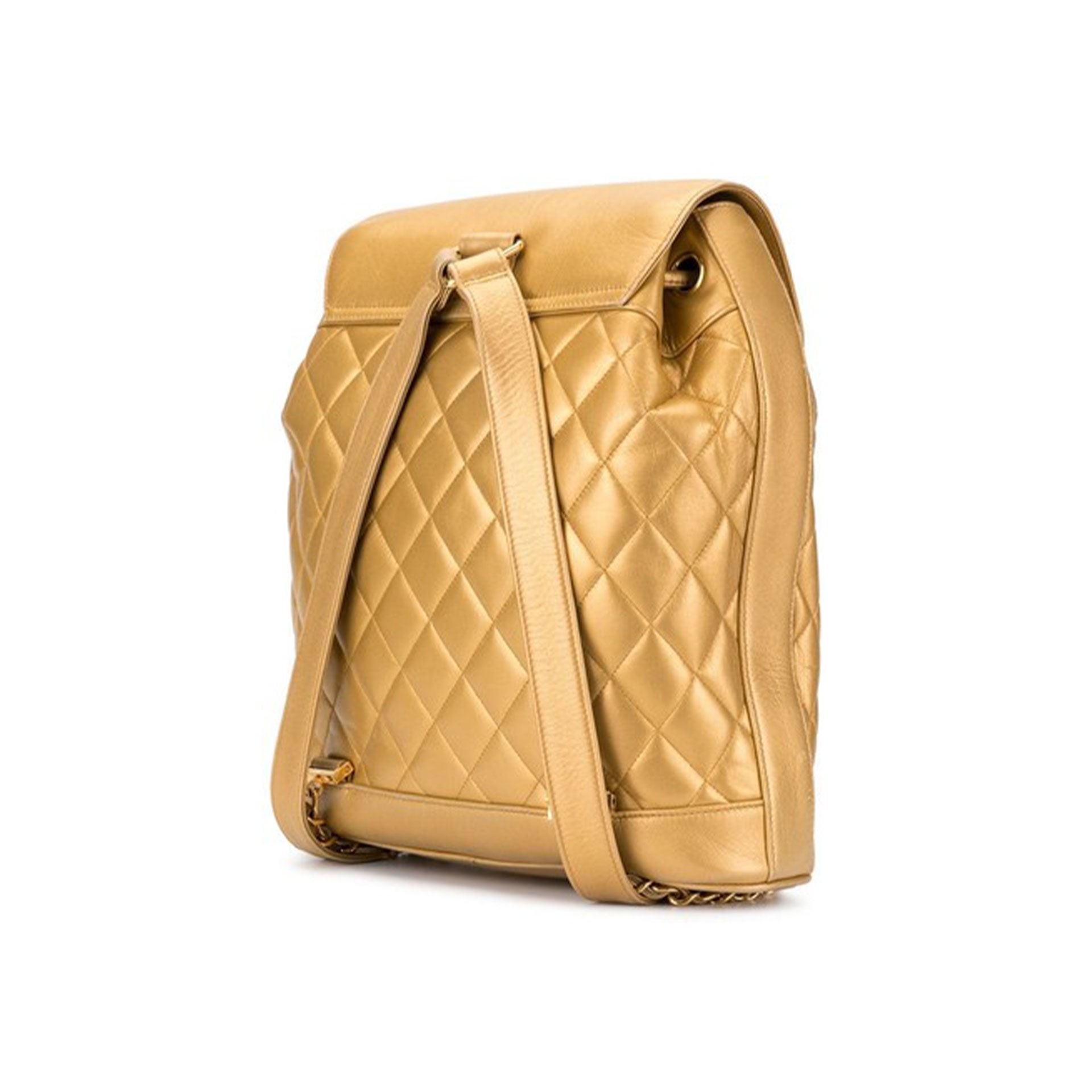 CHANEL Beige Lambskin Leather Vintage Flap Backpack - The Purse Ladies