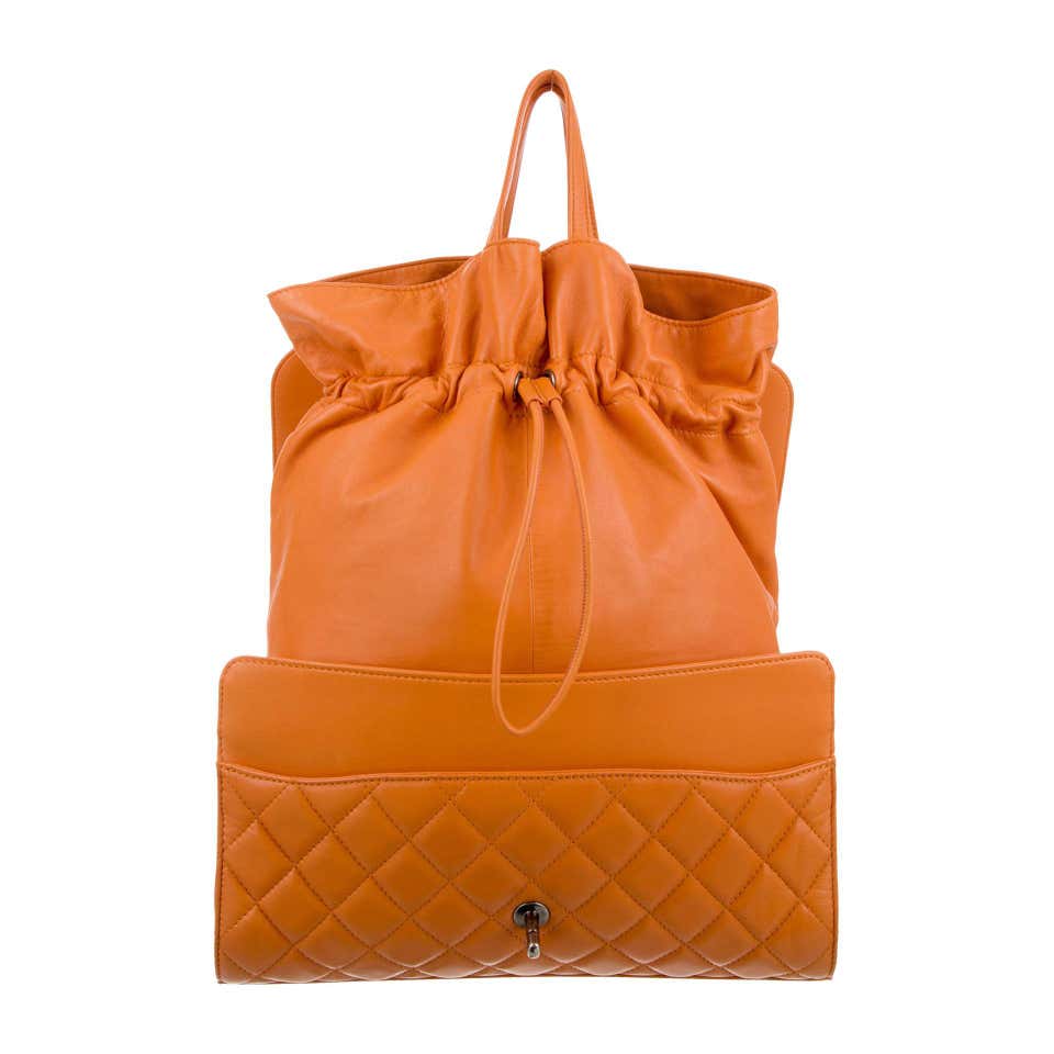 Chanel Mandarin Orange Shopper Drawstring Flap Bag – House of Carver